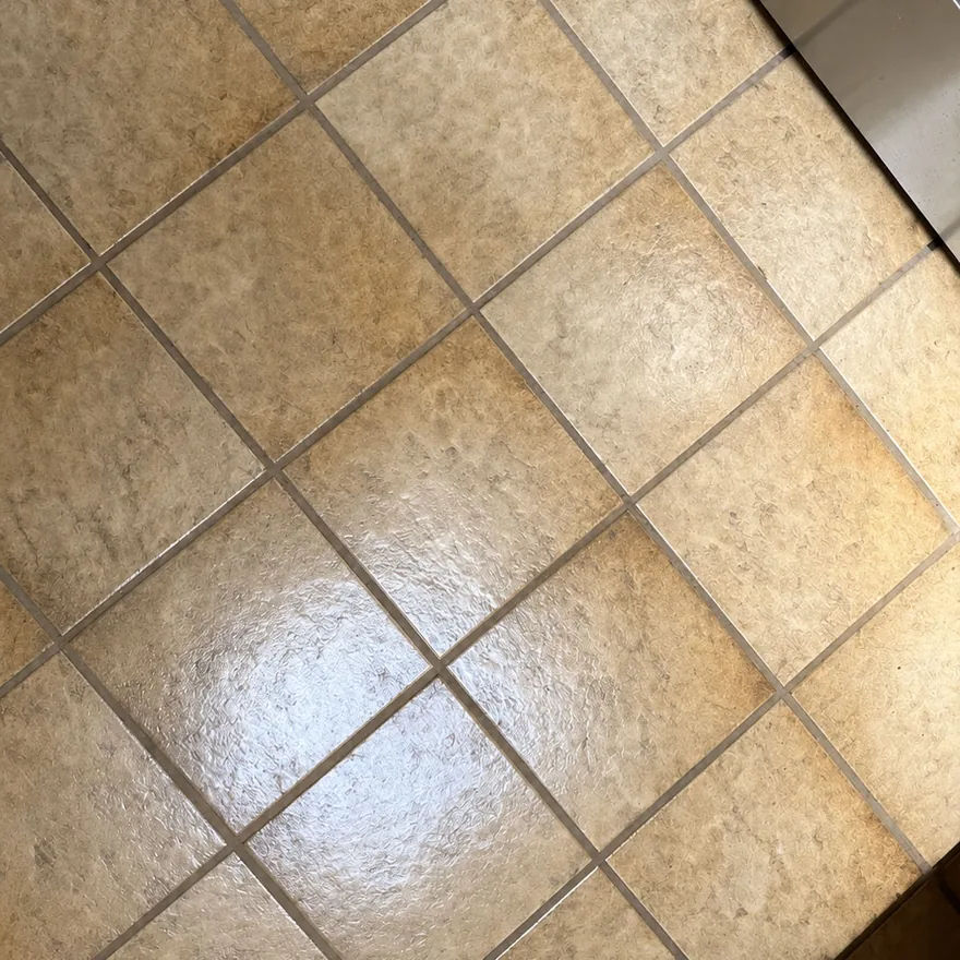 Clean tile grout after laser cleaning