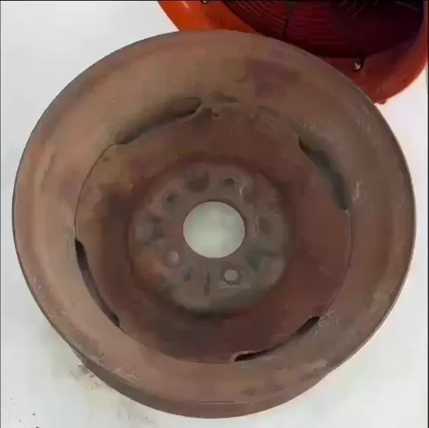 Steel wheel before, heavy rust